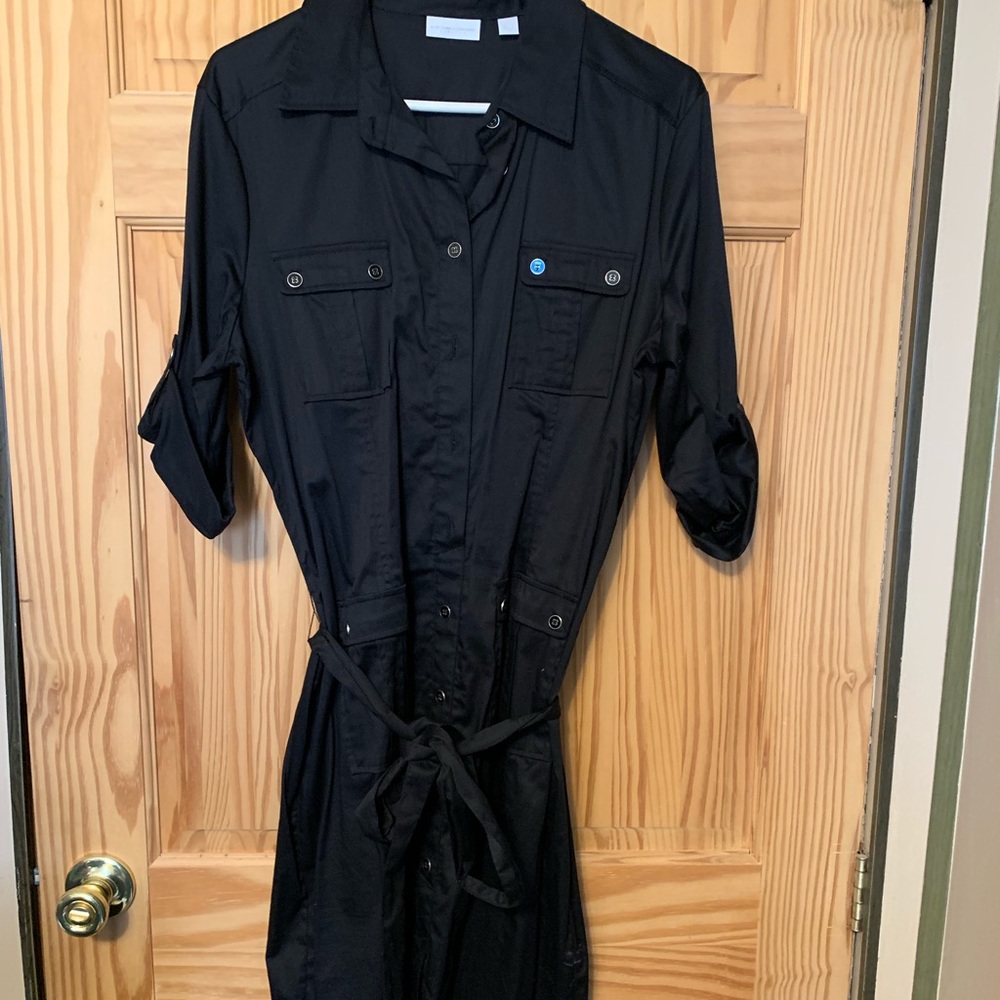 Black dress with belt. Never worn.